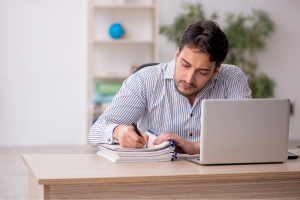 Man taking notes